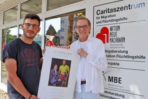 Mohammed Isso und Thomas Schönwälder machten gemeinsam die Bilder für die Ausstellung. Bild: Carsten Düppengießer / Caritas Euskirchen